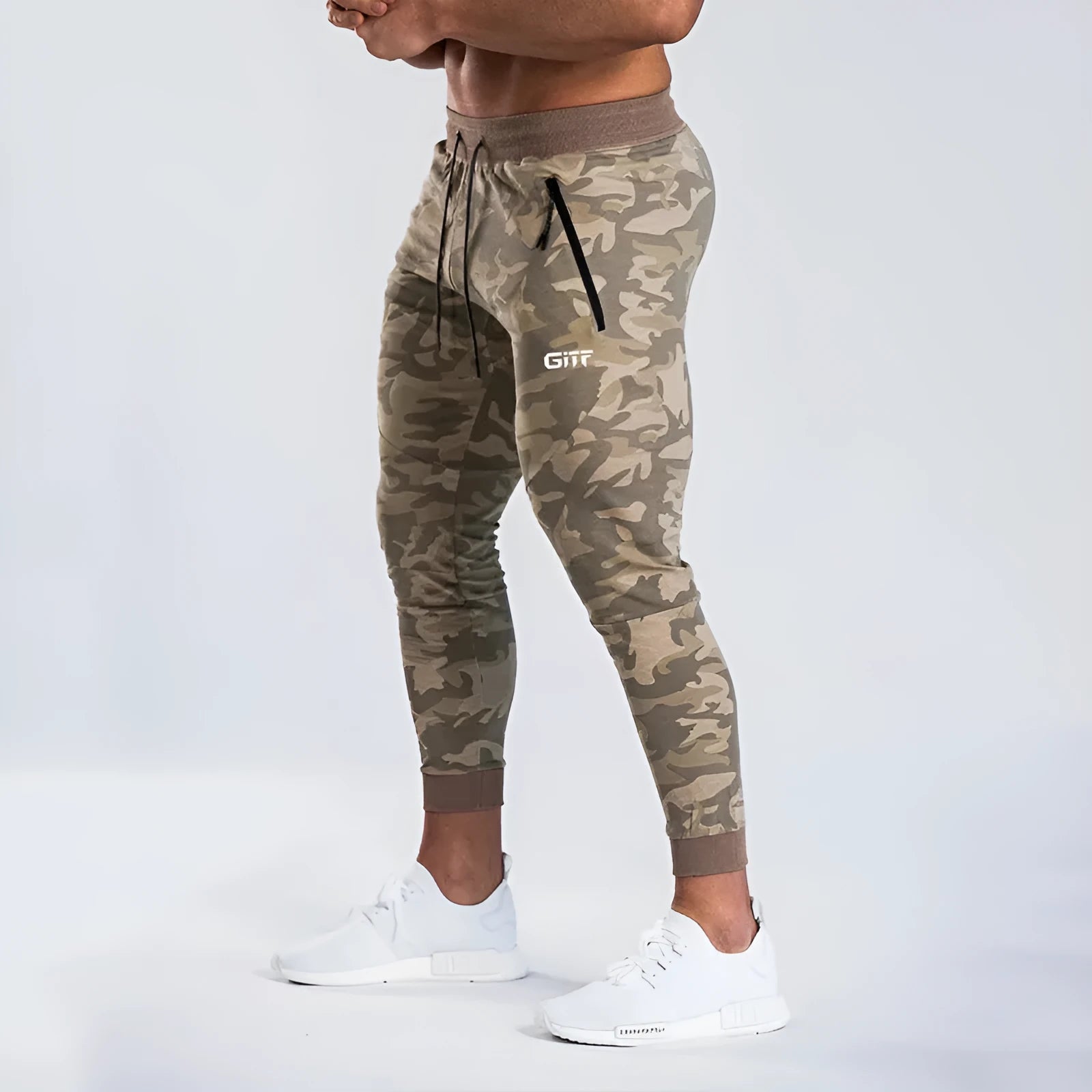 Men's camouflage quick dry jogging trousers in slim fit style from front view on plain background