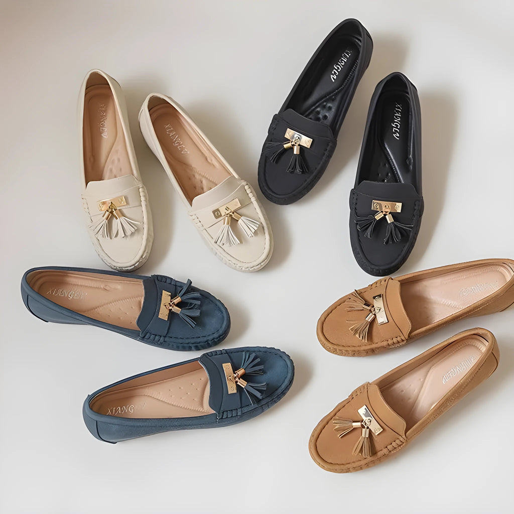 Nude coloured heel lift insoles for women's shoes, showing artificial PU leather upper and round toe shape.