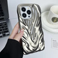Matte titanium gray TPU phone case with three-dimensional hollow wave pattern and electroplating finish