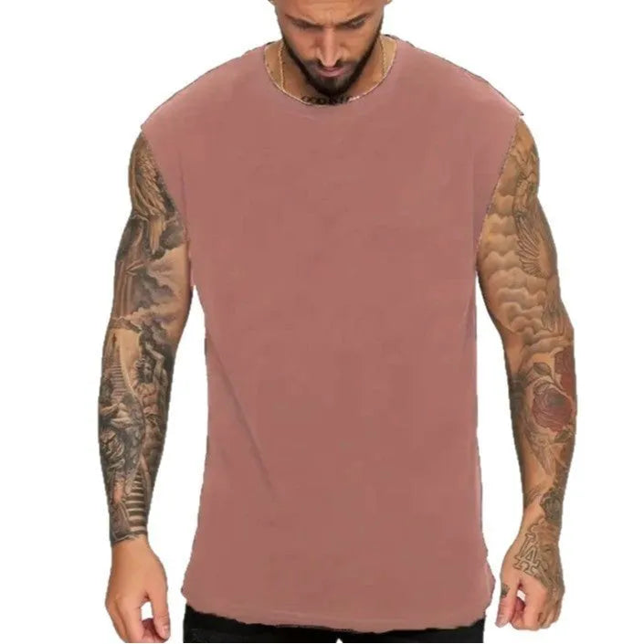 Men's loose solid colour cotton tank top on a hanger, showing straight hem and sleeveless design.