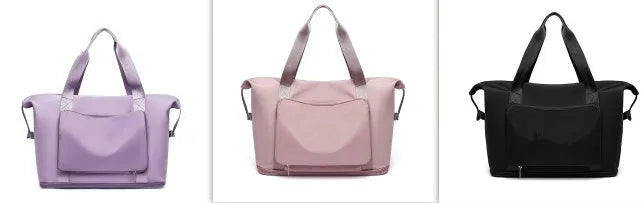 Foldable large capacity women gym bag in black with multiple pockets and shoulder strap