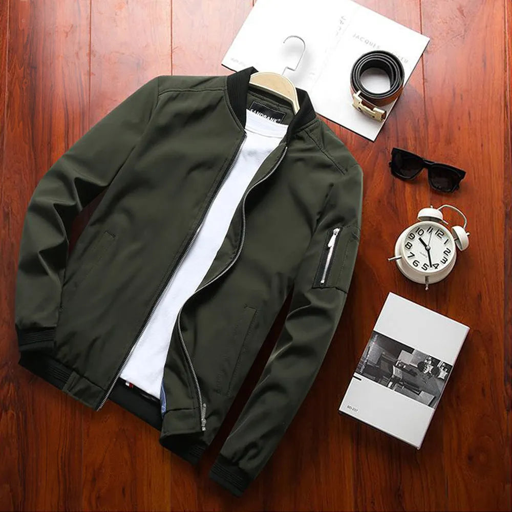Men's slim-fit casual baseball jacket with zippered side pockets in a solid colour.