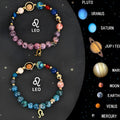 Two natural stone beaded bracelets for zodiac signs laid flat on a textured surface.