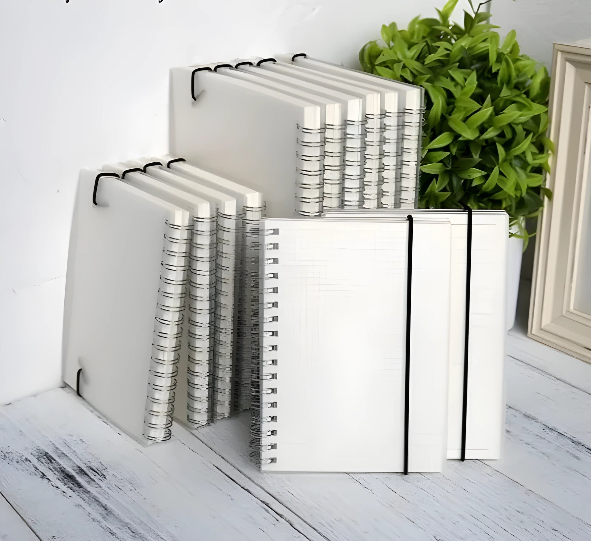 Plastic cover spiral coil notebook with transparent PVC cover and elastic rope, A5 size, cream paper pages visible