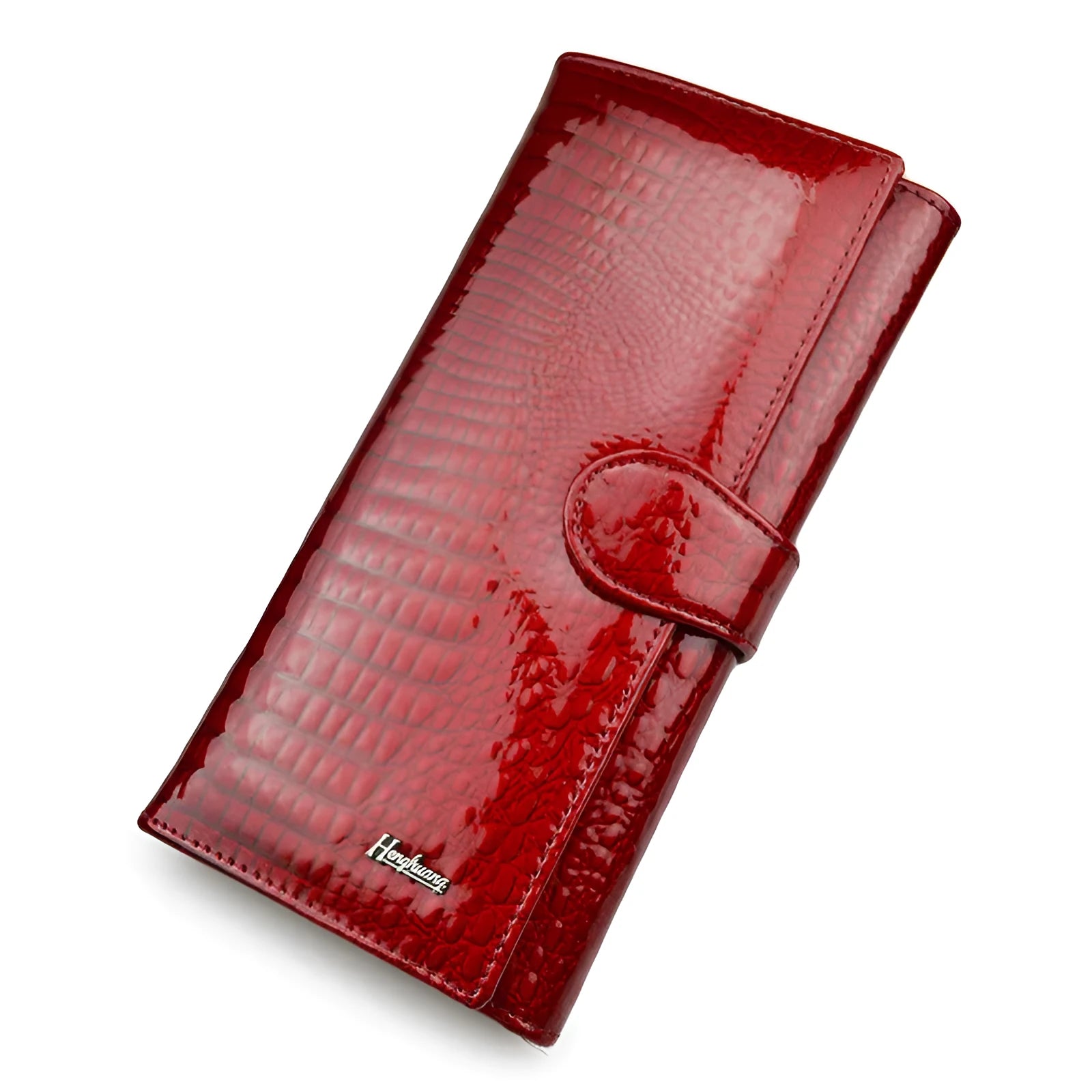 Red women's leather coin purse with a crocodile pattern texture and pigskin lining.