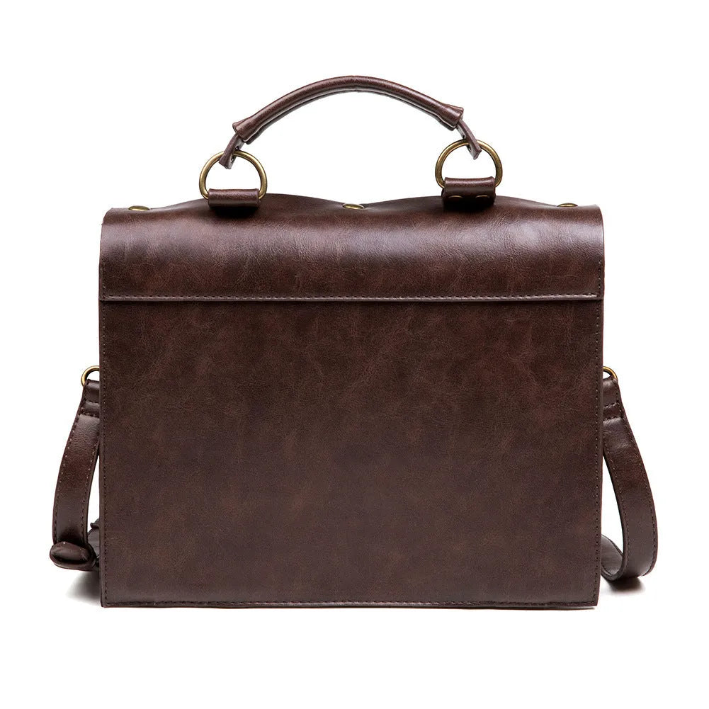 Bronze steampunk shoulder bag with metal hardware and horizontal square pillow design
