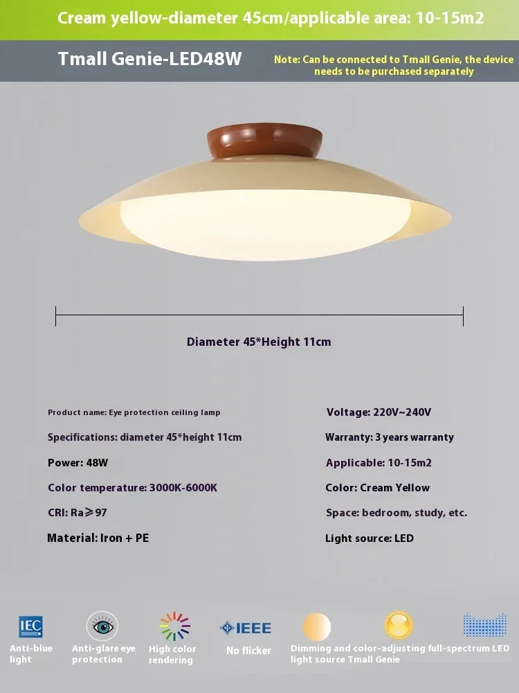 Modern cream style flying saucer shaped ceiling lamp in an iron shade.