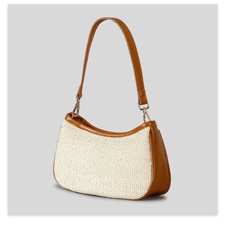 Khaki coloured hand-woven straw selenodon crossbody bag with a single shoulder strap