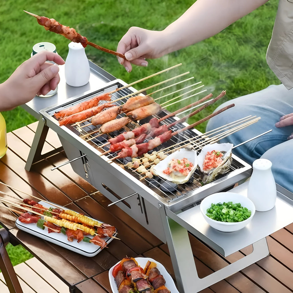 Small portable charcoal grill shown in a folded position for easy transport.