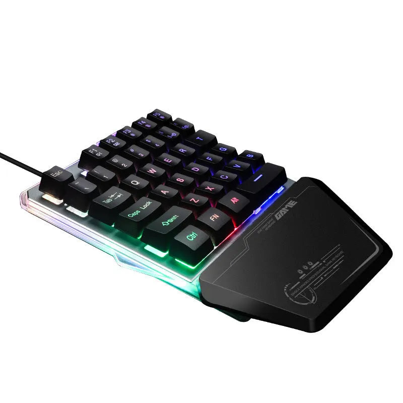 Black G40 Flow one-handed gaming keyboard with RGB backlit keys on a dark surface.