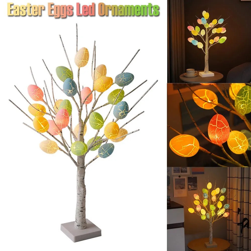 White plastic birch tree Easter decoration with warm white LED lights and hanging coloured eggs on adjustable branches.