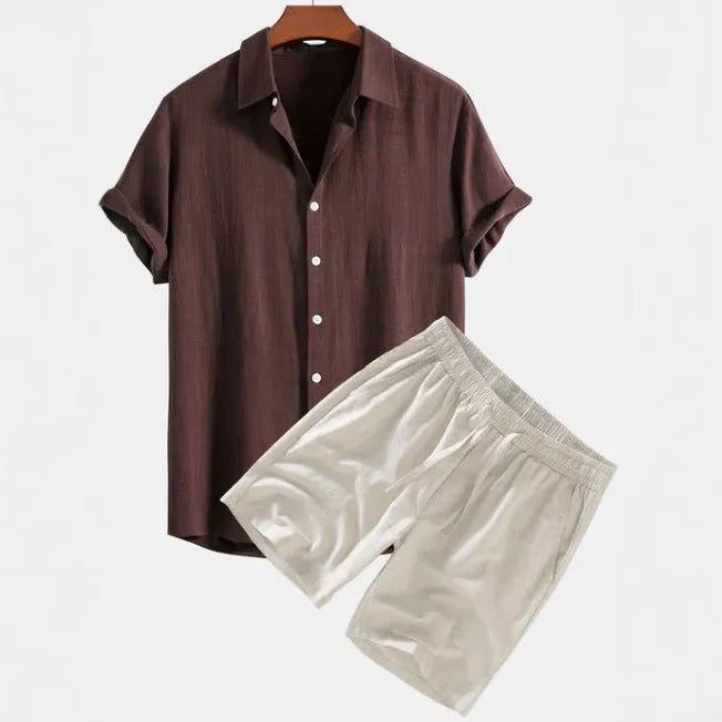 Men's solid colour casual short-sleeved shirt and shorts suit on a hanger.
