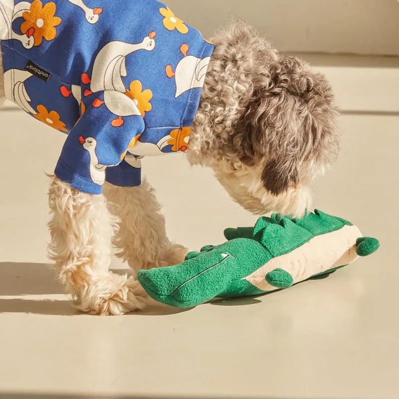 Green durable plush toy dog soft toy measuring 35 cm long.