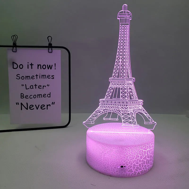 Eiffel Tower shaped table lamp with multi-colour 3D visual slide design and acrylic lampshade.