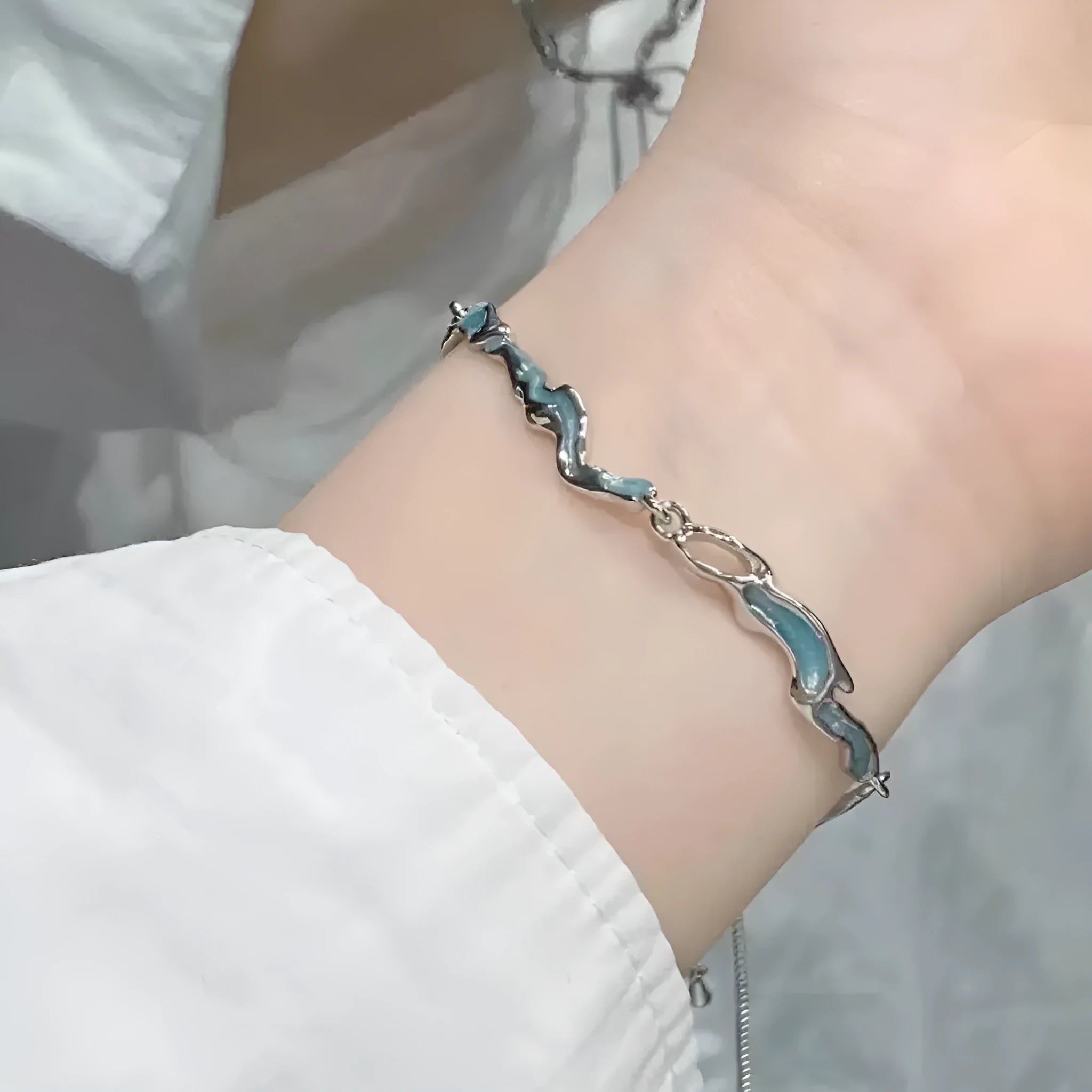 Fashion crystal zircon alloy bracelet for women in electroplated finish with blue wave design