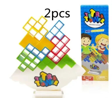Plastic balance stacking game with colourful building blocks on chassis for family play