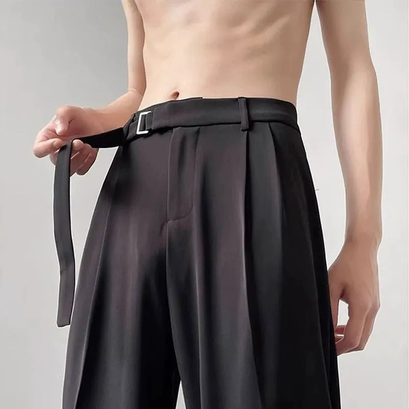 Women's thin straight wide leg trousers in black, showcasing loose fit and non-ironing fabric.