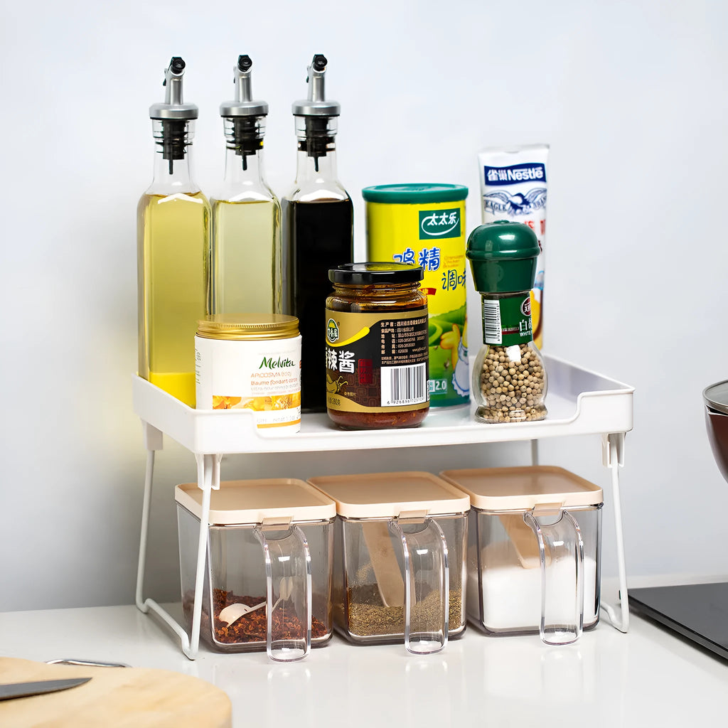 Transparent or white plastic kitchen supplies rack on a countertop or inside a cupboard