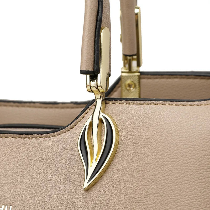Women's PU leather messenger bag with multiple compartments and adjustable shoulder strap
