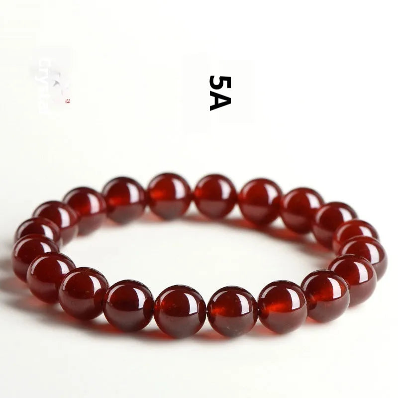 Natural orange red garnet crystal bracelet with traditional ruyi design elements in retro unisex style