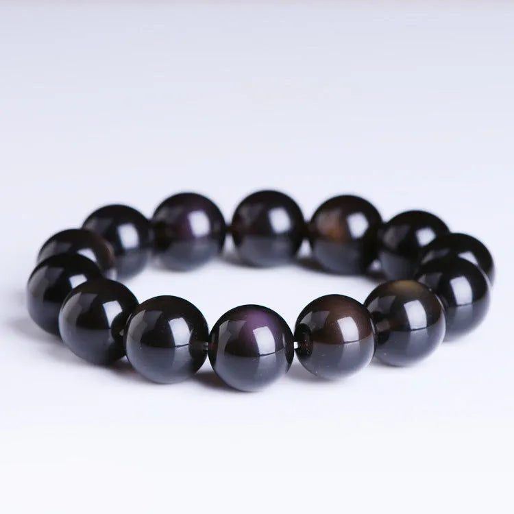 Polished crystal Pi Xiu bracelet with double-eye ice stone colouration in ethnic geometric style