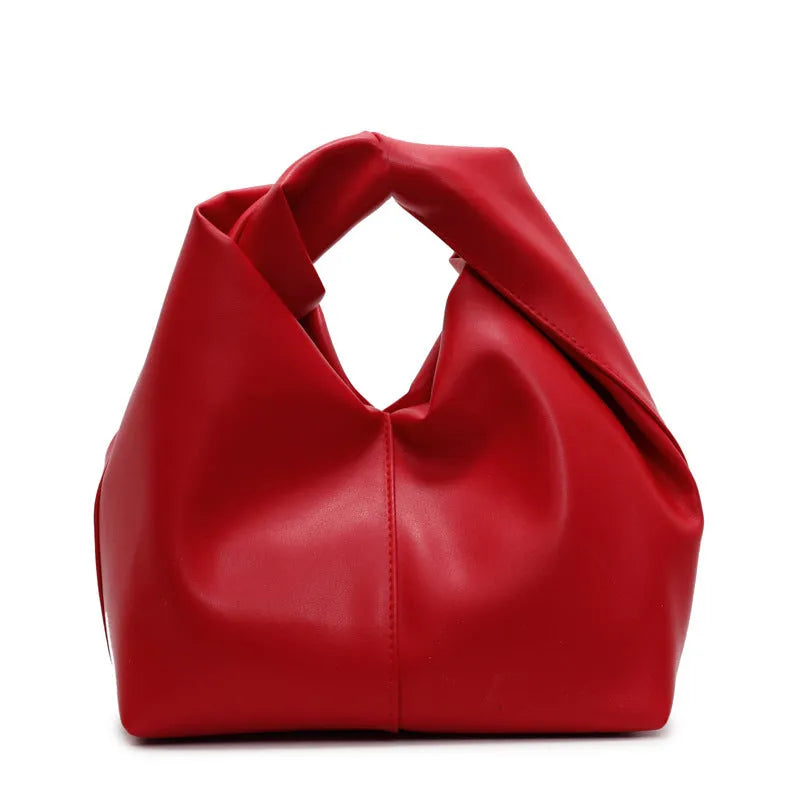 PU women's casual handbag in dumpling shape with sandwich pocket, shown in multiple colours.