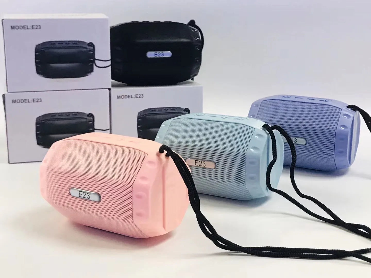 Small rectangular wireless USB Bluetooth speaker in black, blue, pink, or purple colour