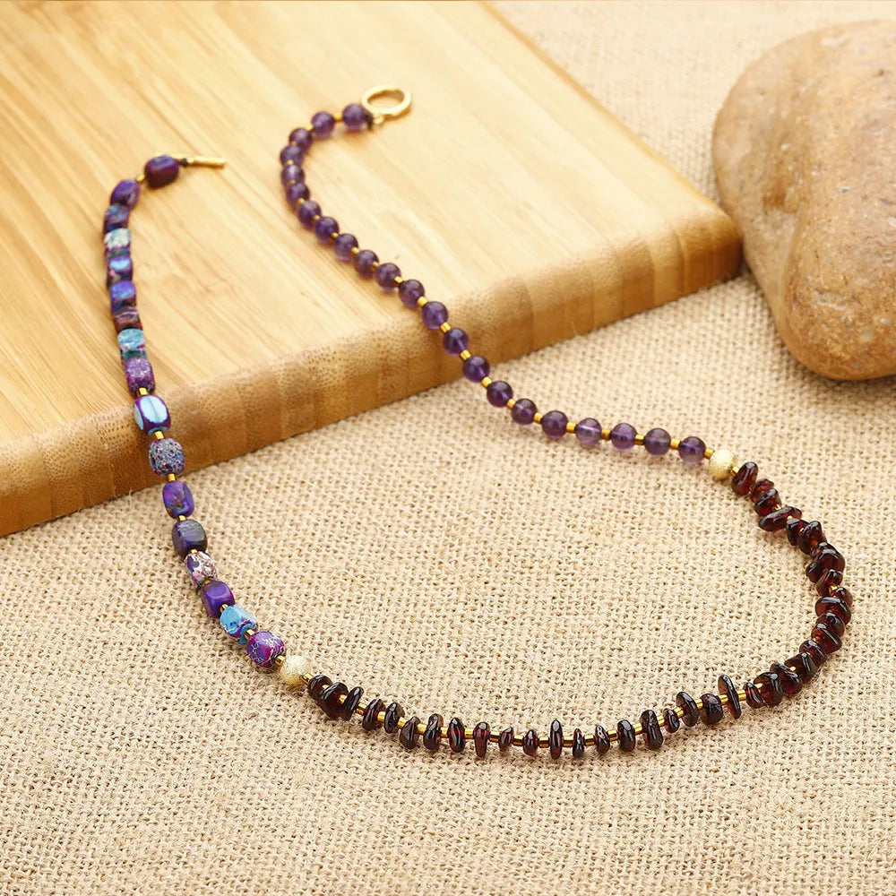 Purple amethyst and garnet stone bracelet with geometric beads and texture details