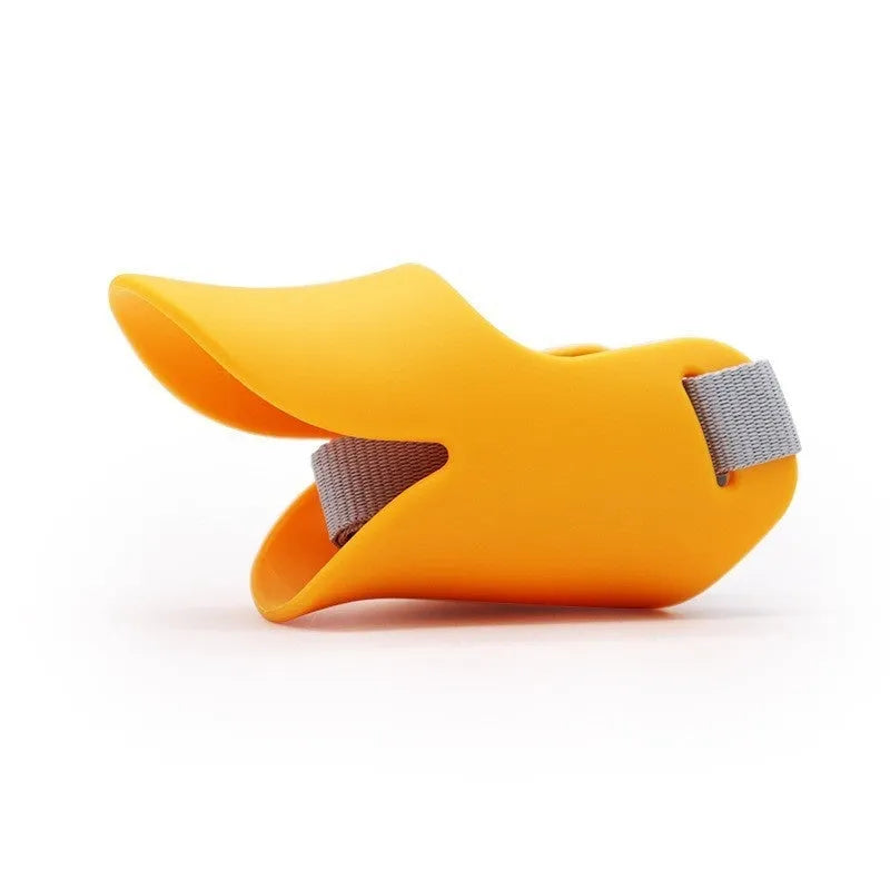 Blue TPR dog duckbill muzzle mouth cover for small to medium dogs, side view on light background