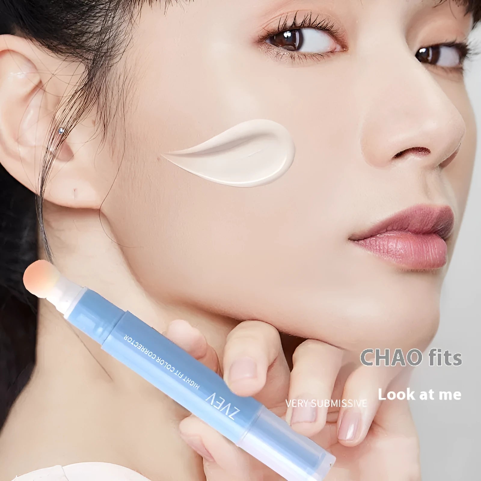 Concealer cream tube with sponge brush head applicator showing three colour shades