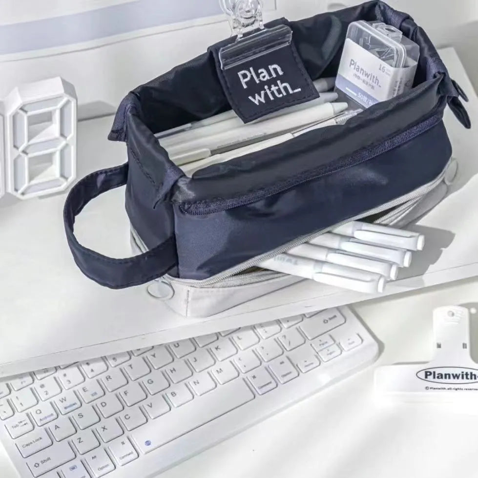 Folding double layer student pencil case in blue, navy blue, and cream white colours