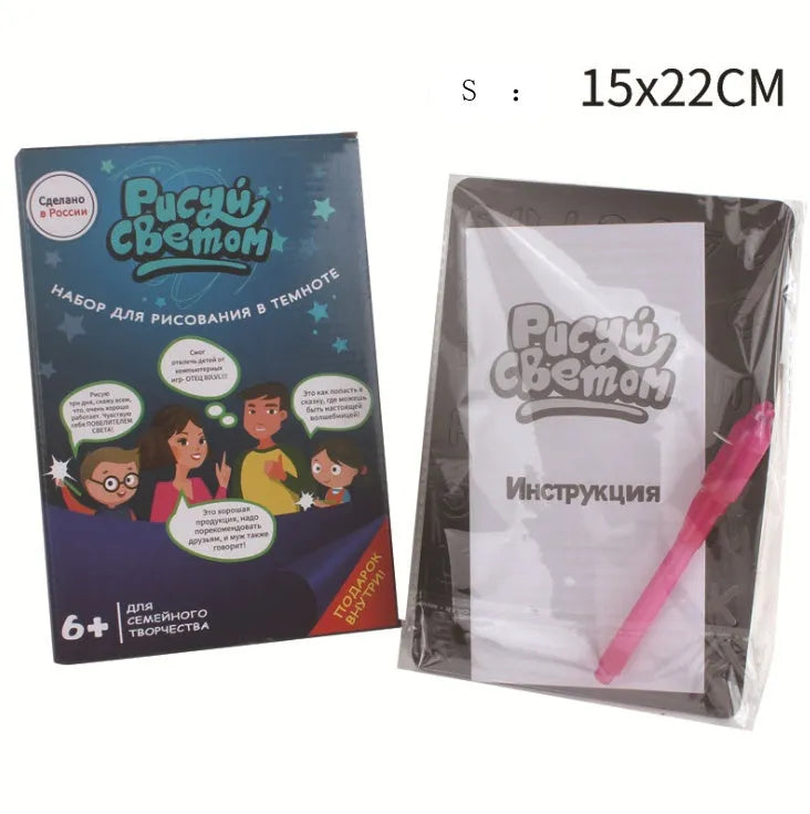 Educational drawing pad with light-accumulating coating, flashlight marker, and alphabet template for children aged 4-6.