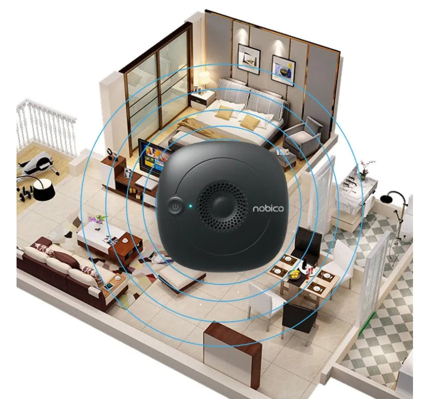 Black and wood grain handheld ultrasonic bed vacuum cleaner on a mattress.