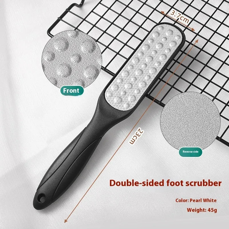 Stainless steel foot grinder file with attached sandpaper pad and separate black and white refill packs.