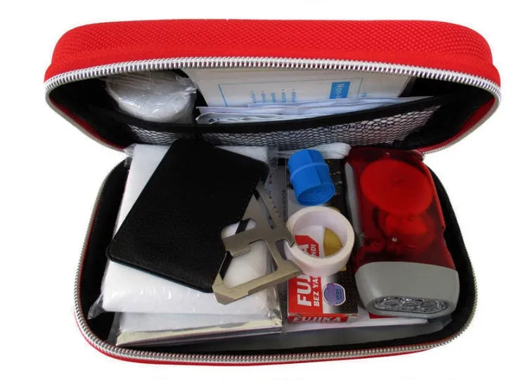 Red square plastic emergency survival medical kit box 21x13x6cm with 18 first aid pieces including scissors, bandage, plasters, and flashlight