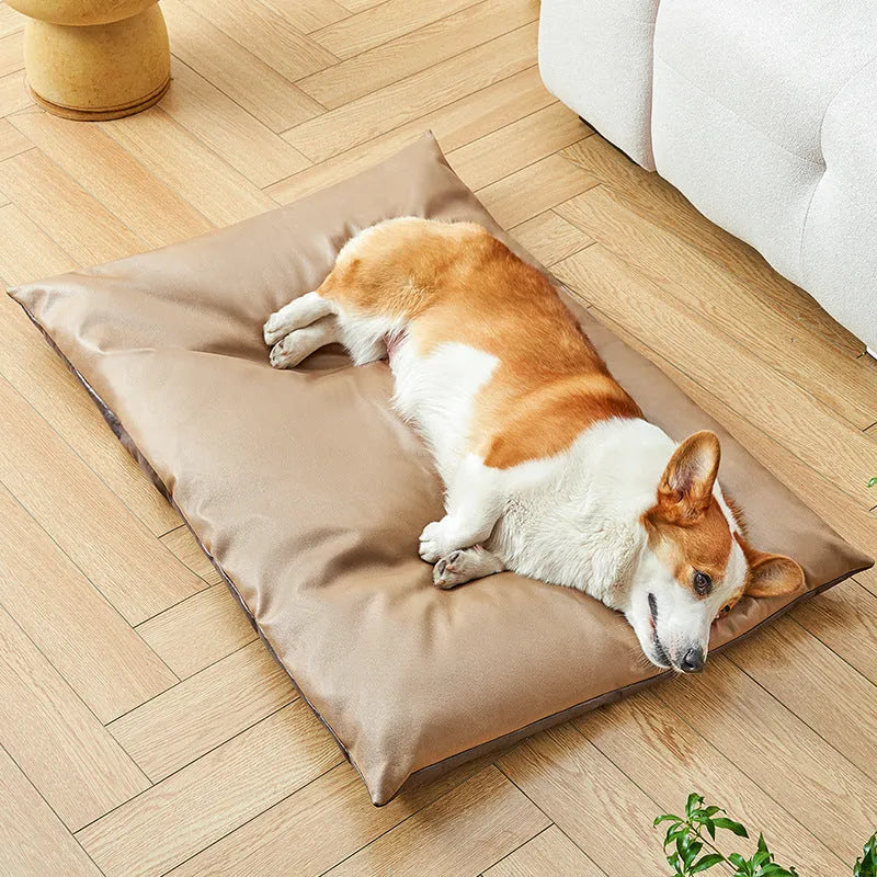 Blue and coffee coloured cool summer pet sleeping mat for cats and dogs shown in four different sizes.