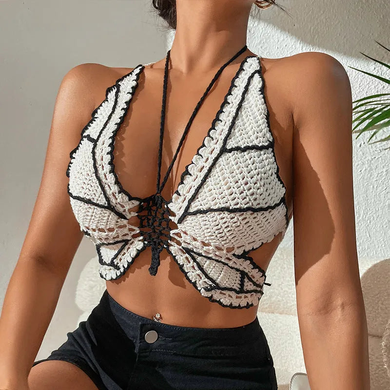 Women's black and white classic bikini swimsuit with colour block design and halter neck