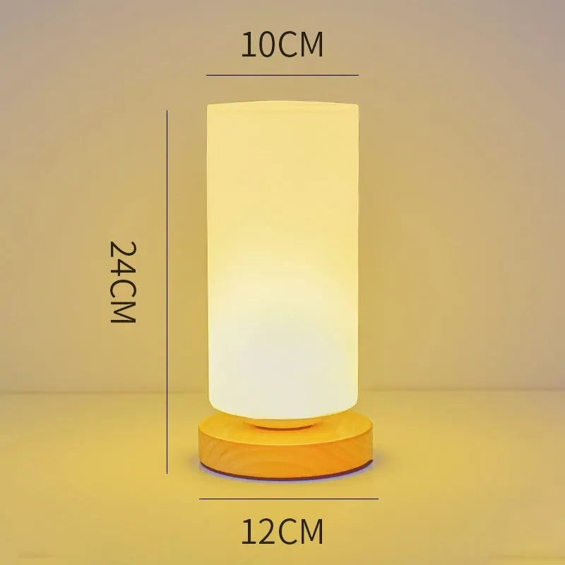 Nordic solid wood base USB table lamp in a choice of cube, column, cylinder, or ball shapes with touch dimming.