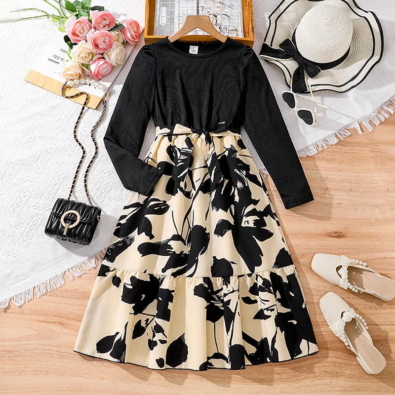 Girls' long sleeve knitted princess dress with retro floral patchwork print, black or graphite, sizes 130cm to 170cm.