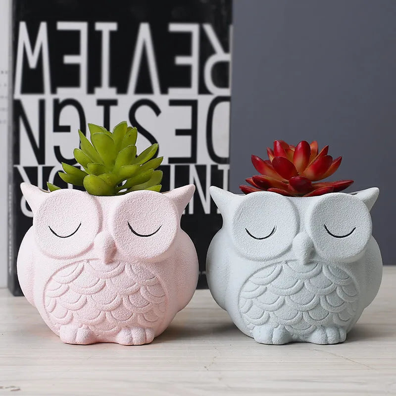 Handmade frosted owl ceramic succulent pot in light pink, showing cartoon design and 11cm size.