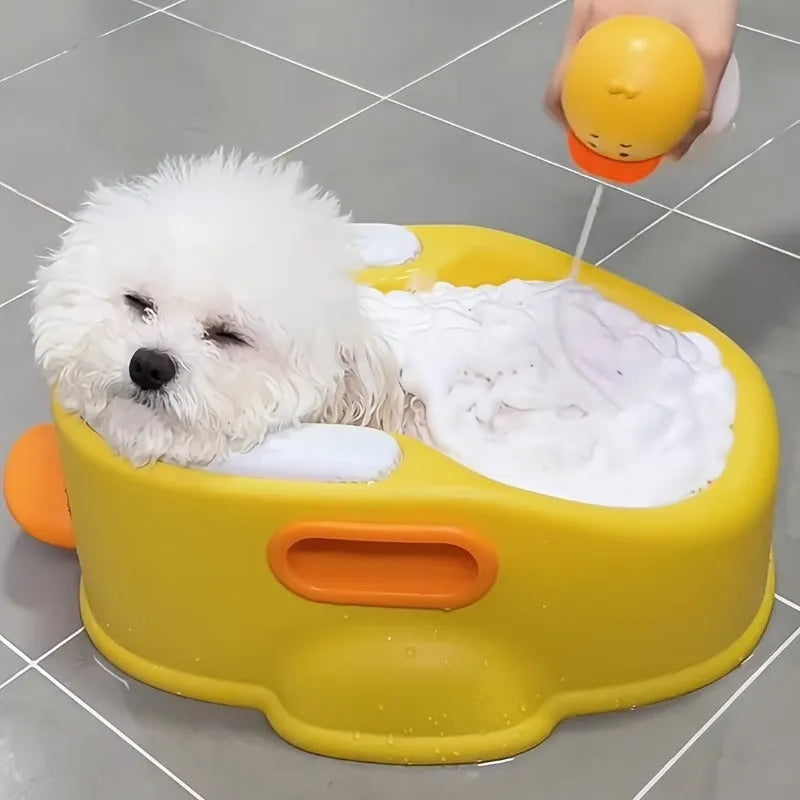 Blue PVC duck-shaped bathtub for washing a dog or cat