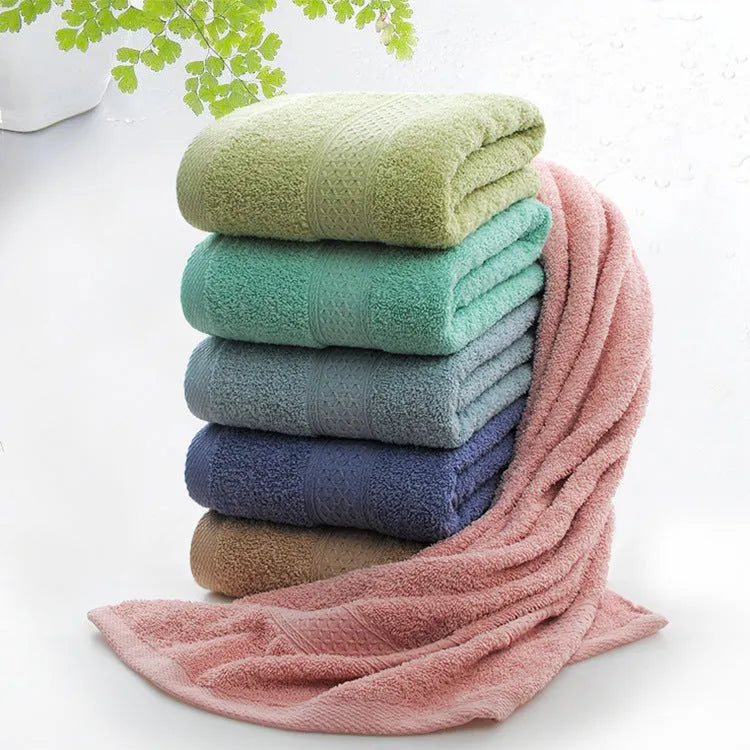 Thickened cotton blend bath beach towel showing colour options including green, blue, brown, and pink