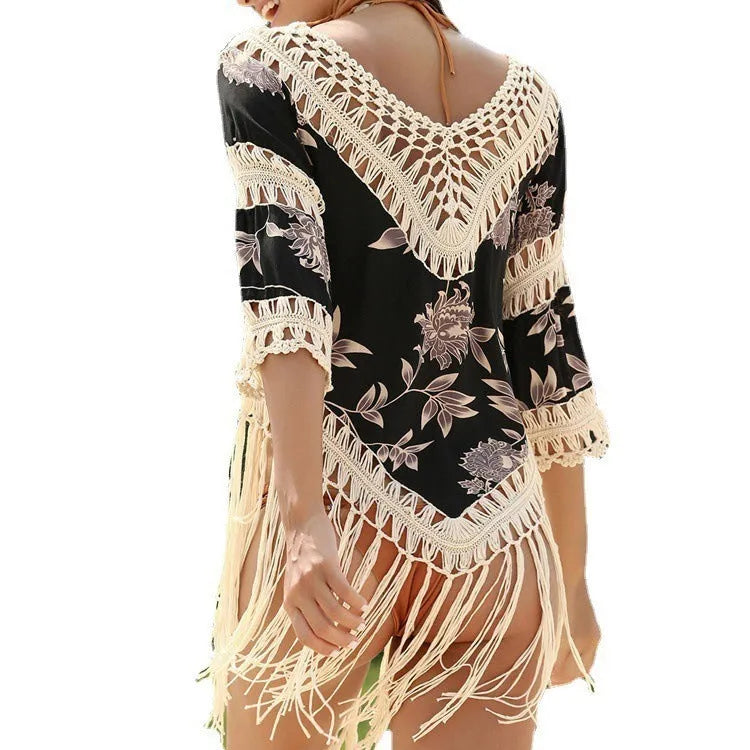 Women's apricot coloured V-neck sun protection shirt with hollow-out long sleeves for beachwear.