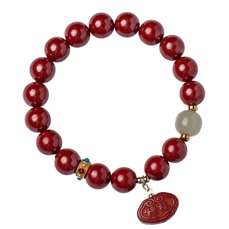 Natural cinnabar Emperor sandstone bracelet with traditional Ping An Fu Lu motifs