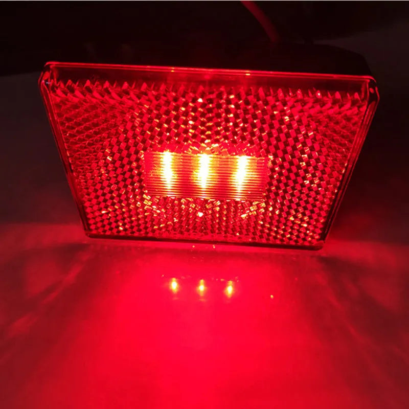 Red LED trailer side clearance light with transparent PC lens and 19cm wire.