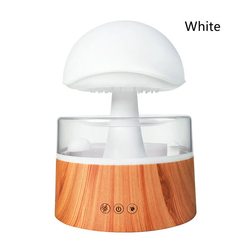 White cloud-shaped ultrasonic aroma diffuser and humidifier with simulated raindrops and coloured lights.