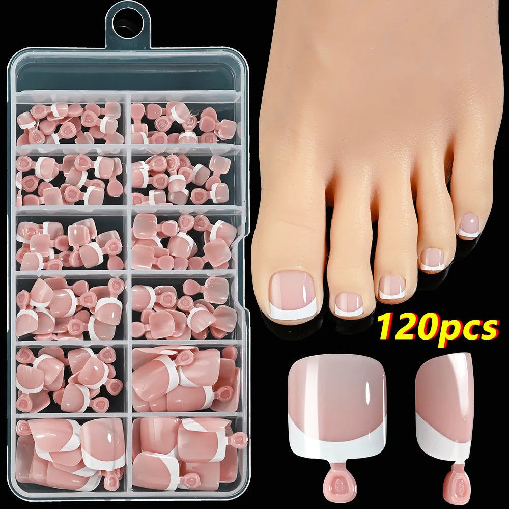 Open box showing 120 French white edge nude square false toe nail pieces in various shades.