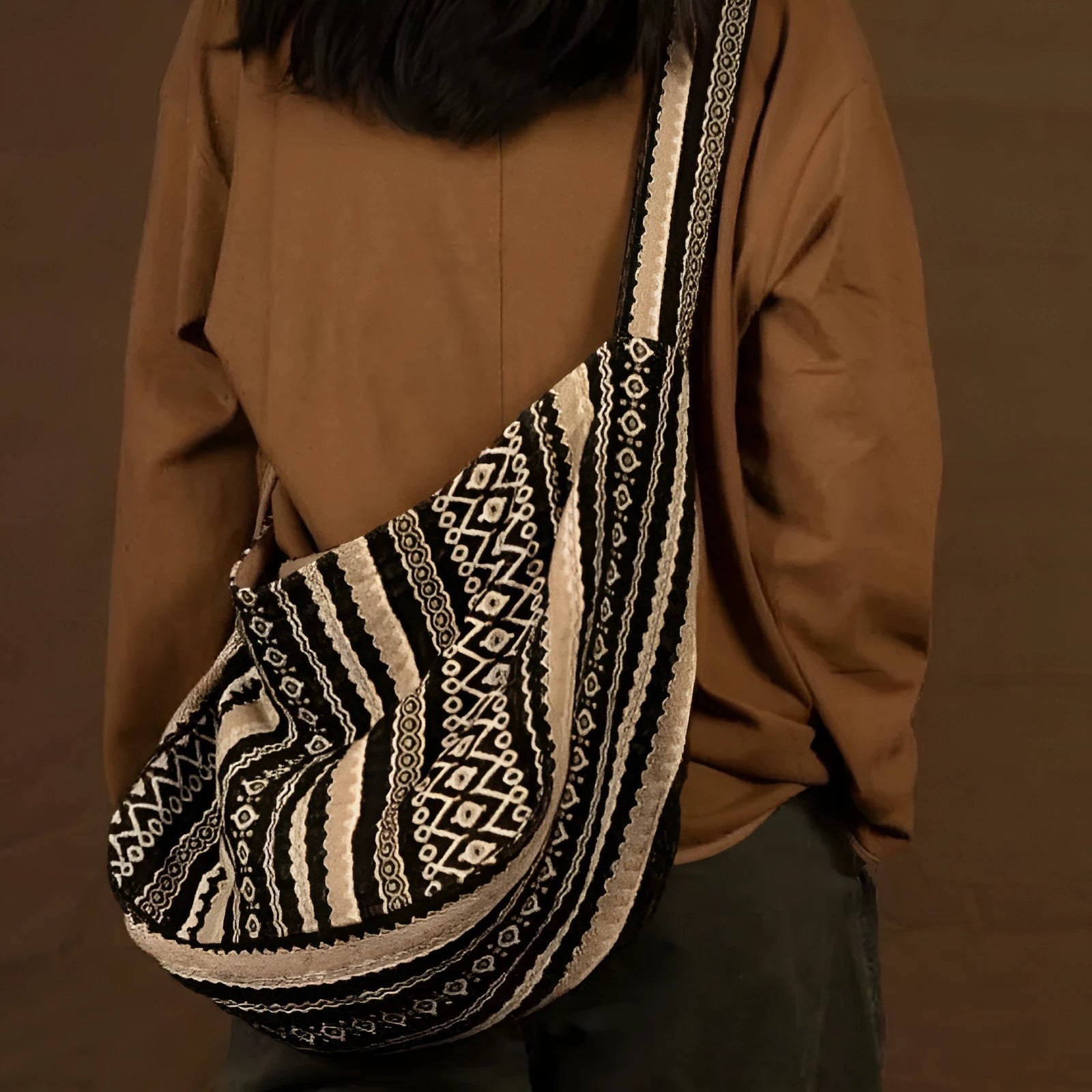 Retro striped corduroy messenger bag with adjustable shoulder strap showing jacquard pattern