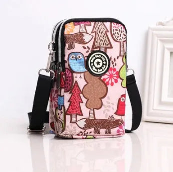 Vertical mobile phone bag in black with Oxford Spinning texture and zipper closure