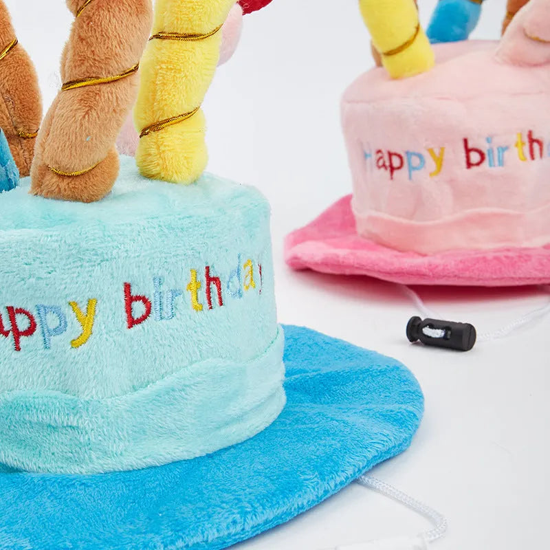 Blue and pink dog birthday hats showing 21cm by 15cm by 6.5cm dimensions